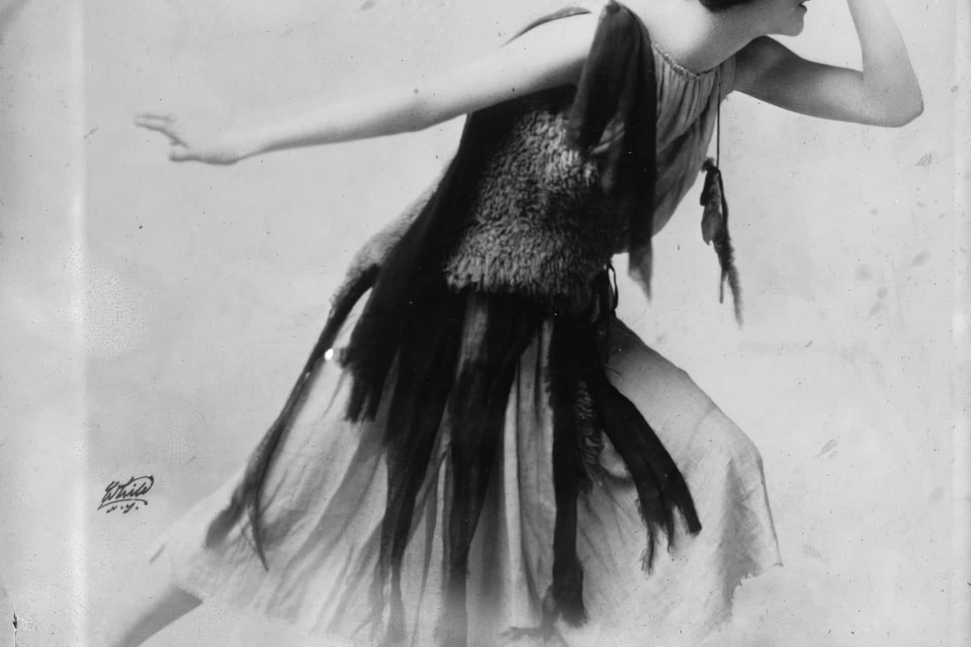 Violet Romer in flapper dress